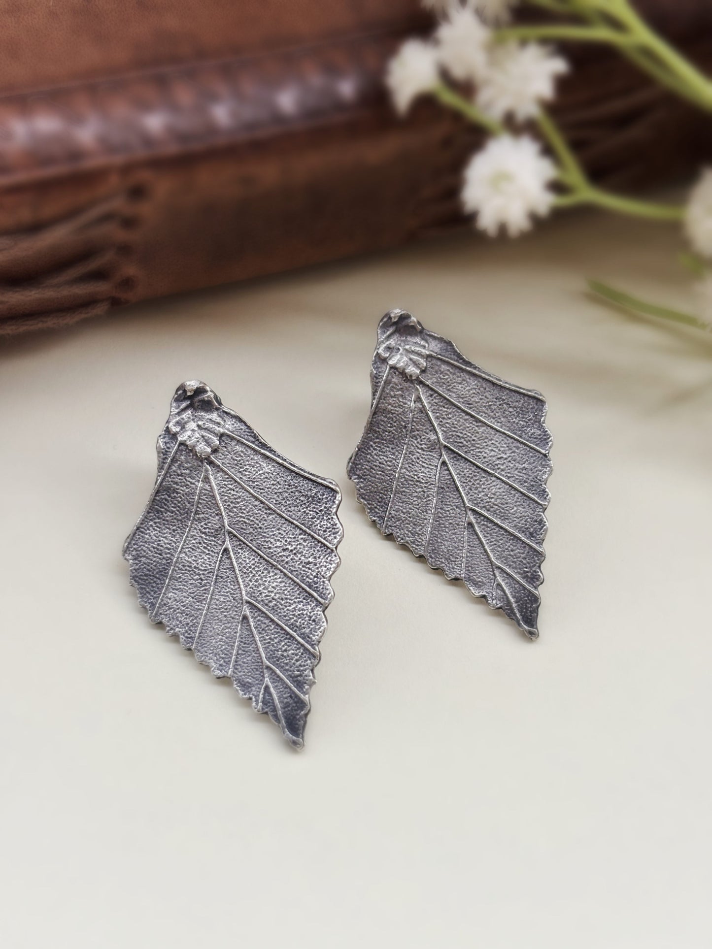 Quirky Parnika Leaf Studs Silver Oxidized Boho Earrings