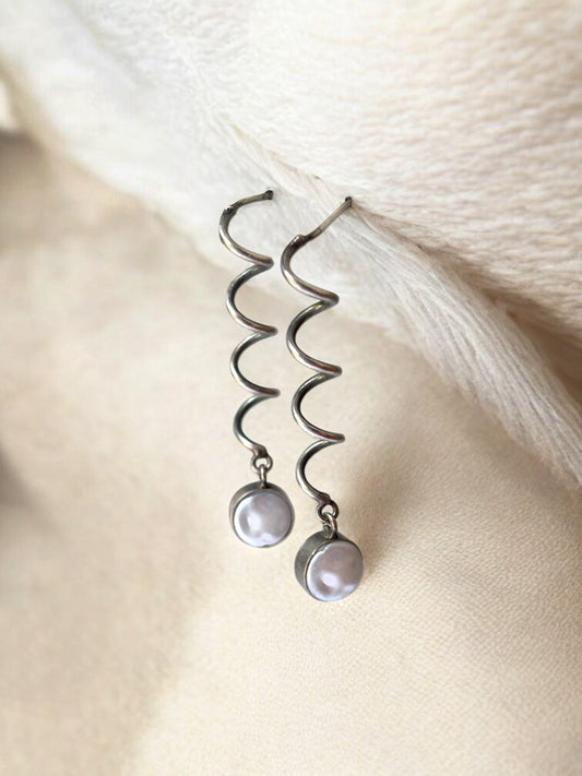 Avartaka Pearl Spiral Dangle Earrings – Oxidized Silver Replica in Brass