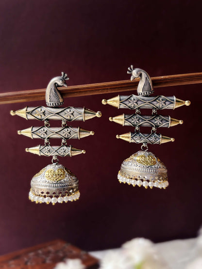 Navilla Pearl Oxidized Dual Tone Golden Silver Jhumka Earrings