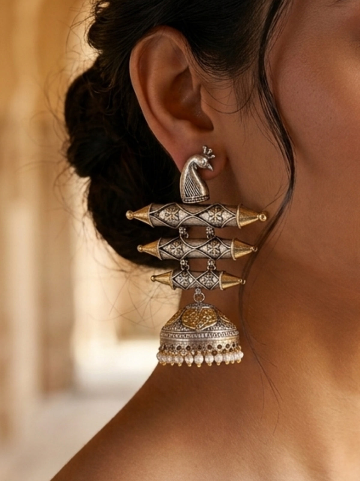 Navilla Pearl Oxidized Dual Tone Golden Silver Jhumka Earrings