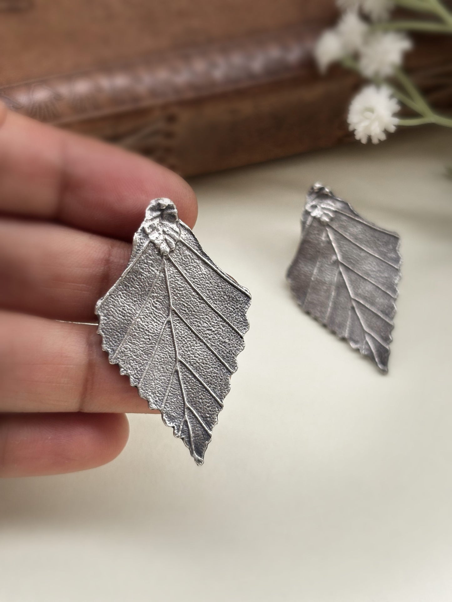 Quirky Parnika Leaf Studs Silver Oxidized Boho Earrings