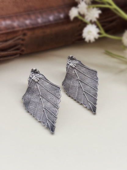 Quirky Parnika Leaf Studs Silver Oxidized Boho Earrings