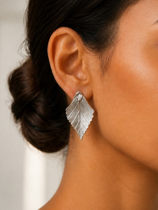 Quirky Parnika Leaf Studs Silver Oxidized Boho Earrings